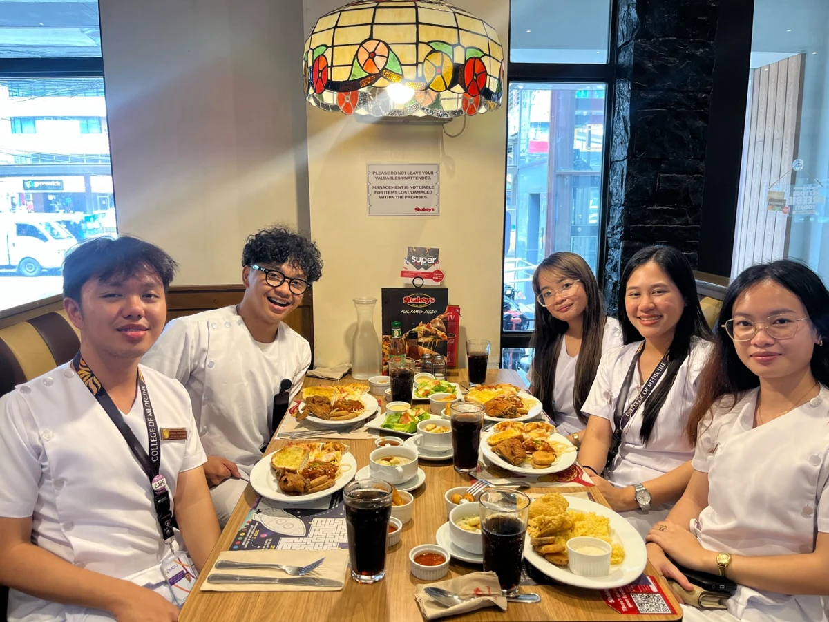 Friends enjoying lunch after their Citric Acid Cycle quiz